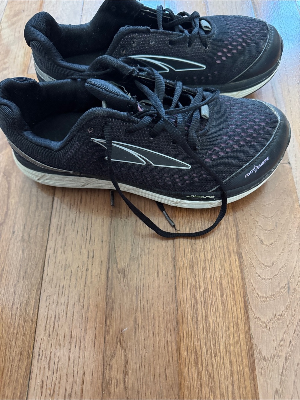 Altra Black Running Shoes with White Midsole and Pink Accents